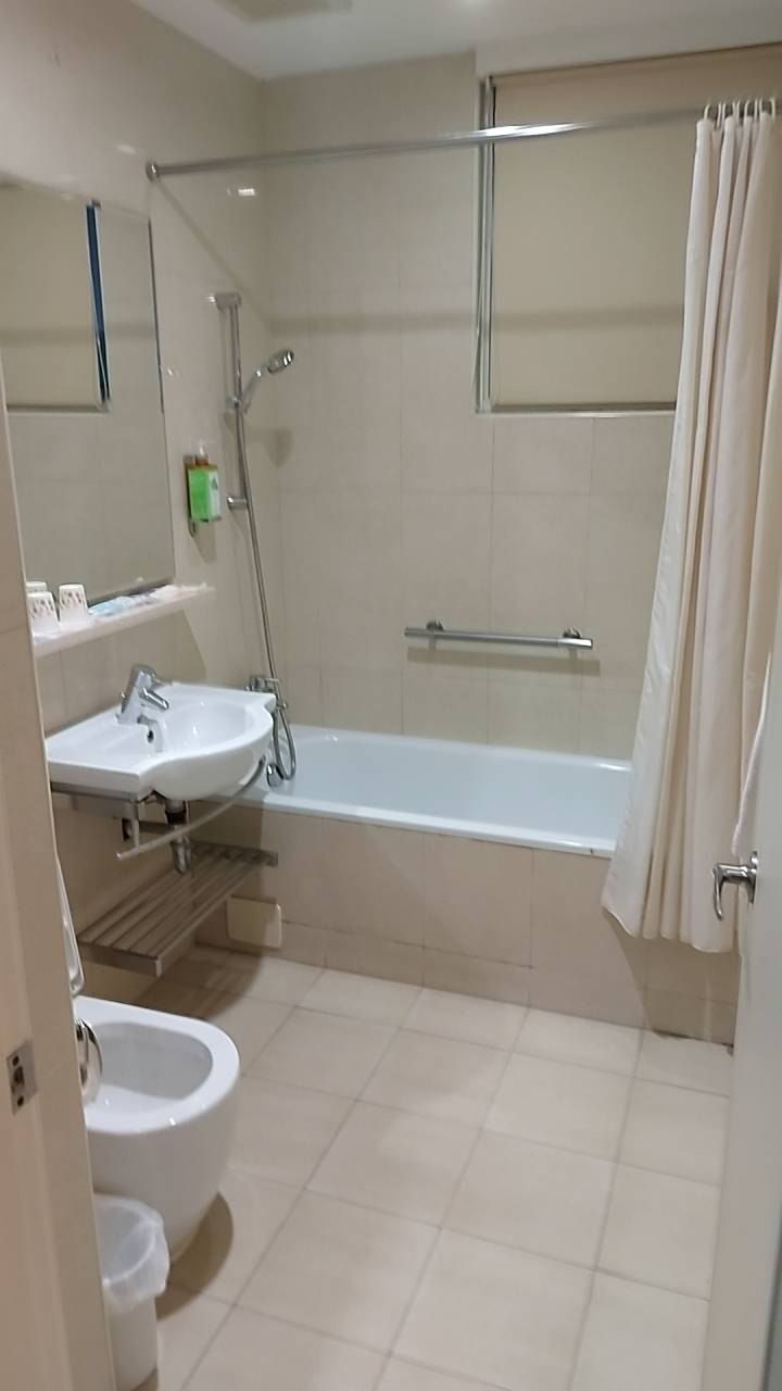 九閣商務旅店